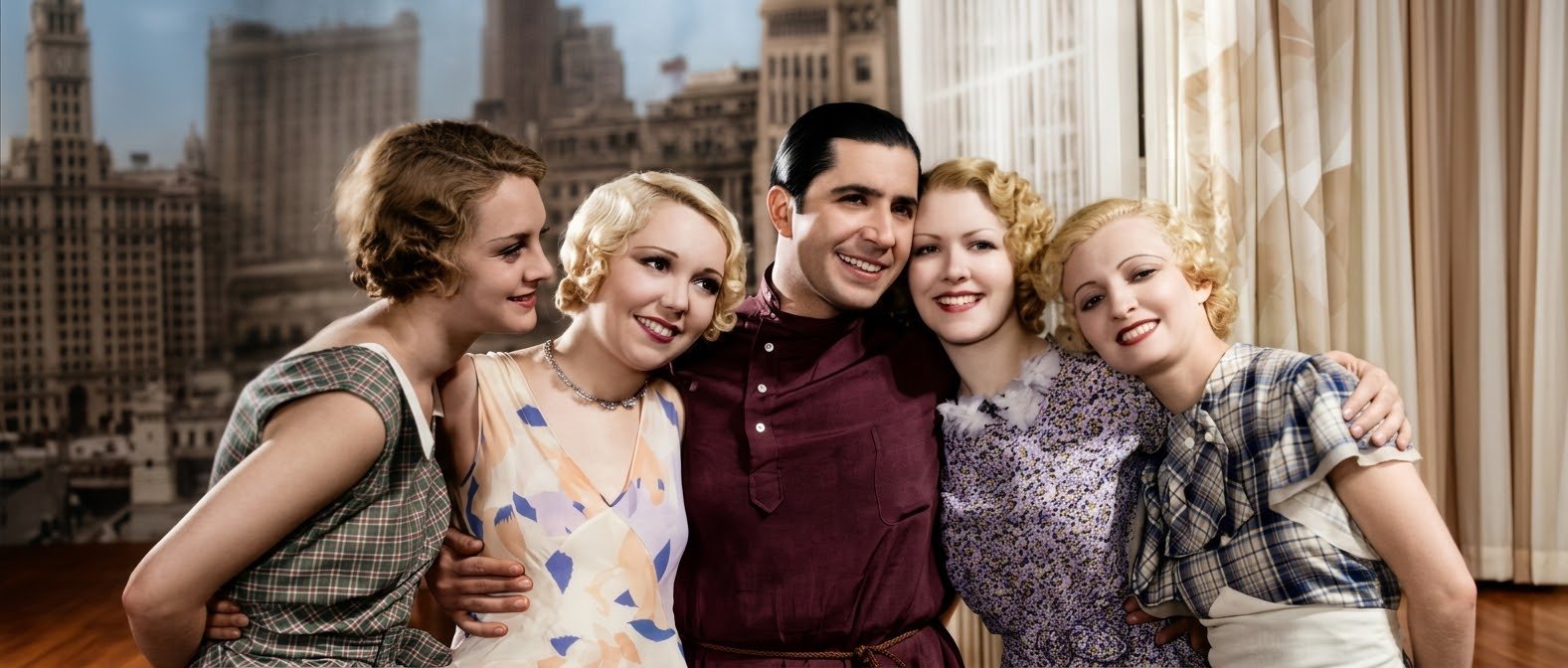 Carlos Gardel surrounded by five women
